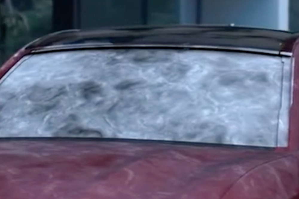 A close up of a frosted windscreen of a Ford Mustang Mach-E during winter.