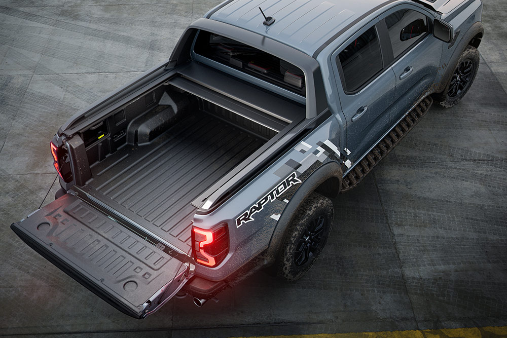 Rear view of a Ford Ranger Raptor, highlighting the vehicle's load bed and tailgate.