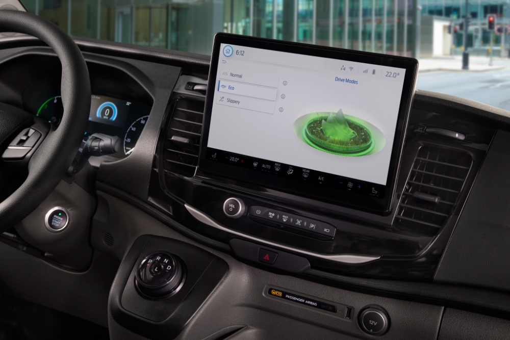  Dashboard of a Ford E-Transit van with a touchscreen displaying drive modes.