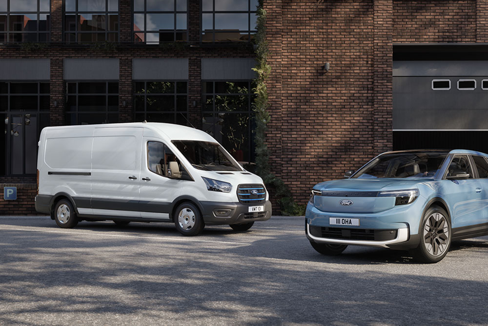 Two Ford fleet vehicles: a white Transit van and a blue Ford Explorer.