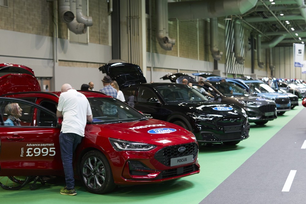 Handicapped people trying out various Ford vehicles
